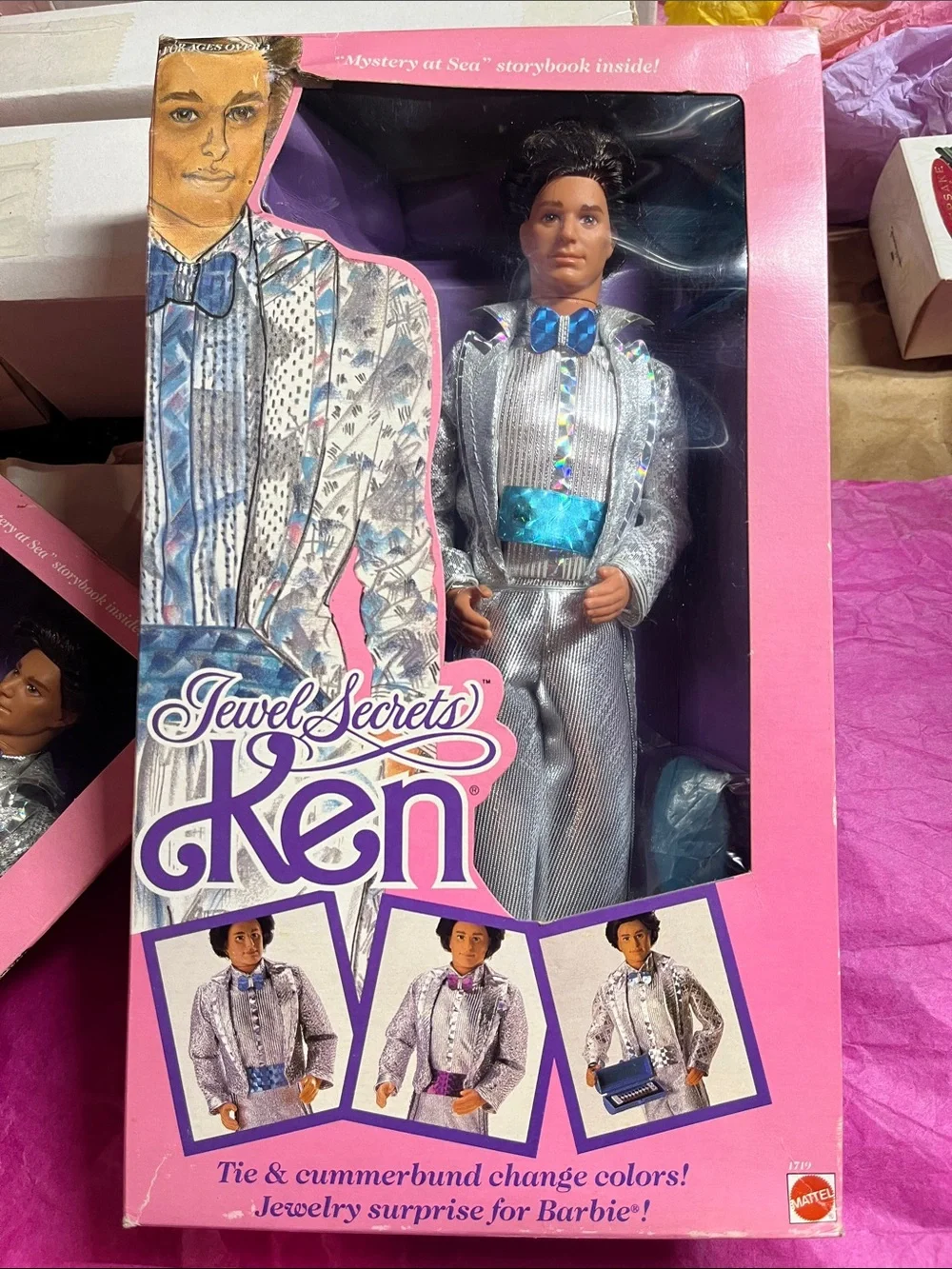 Mattel Ken in Metallic Silver Outfit with Aqua Accents